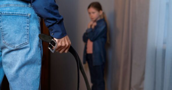 young-child-suffering-abuse-by-parent-with-belt (1)